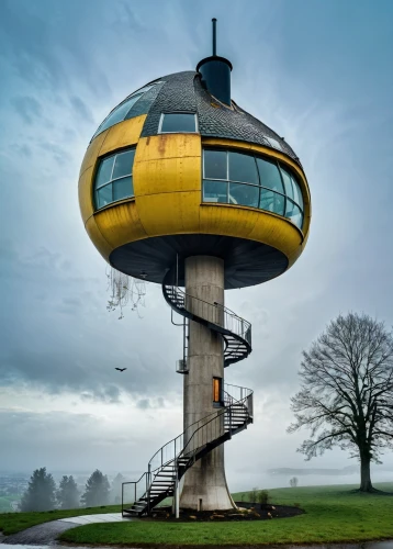 observation tower,control tower,the observation deck,bird tower,flying saucer,observation deck,pigeon house,lookout tower,water tower,watertower,bee-dome,helipad,round house,tree house hotel,rotating beacon,round hut,batemans tower,airship,syringe house,sky train