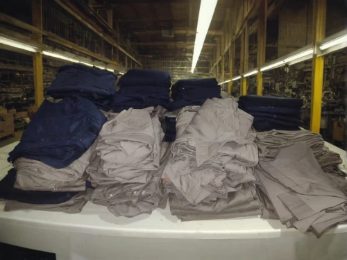 rolls of fabric,garment racks,polar fleece,non woven bags,coveralls,polypropylene bags,denim fabric,manufactures,protective clothing,hat manufacture,garments,denim labels,carpenter jeans,dry cleaning,turning cloths,factories,mollete laundry,personal protective equipment,manufacturing,linen