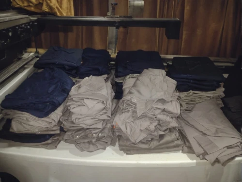chef's uniform,suit trousers,dry laundry,garment racks,laundry supply,laundry,launder,khaki pants,dry cleaning,laundress,mollete laundry,trousers,men clothes,clothes,polo shirts,clotheshorse,turning cloths,washing machines,laundry room,clothes dryer