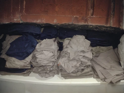 dry laundry,launder,laundry supply,suit trousers,laundress,mollete laundry,washhouse,laundry,linen,dry cleaning,rolls of fabric,clothes dryer,trousers,turning cloths,washing machines,sackcloth,clothes,khaki pants,t-shirts,laundry room