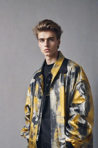 yellow background,windbreaker,outerwear,male model,george russell,camo,jacket,portrait background,photo session in torn clothes,bolero jacket,austin stirling,studio photo,boys fashion,young model,airbrushed,grey background,a wax dummy,menswear,yellow jacket,boy model,Photography,Realistic