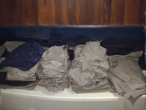 launder,dry laundry,khaki pants,laundry supply,school clothes,clothes,laundry,suit trousers,men clothes,linen,wardrobe,a drawer,chef's uniform,dry cleaning,clothing,laundress,mollete laundry,trousers,turning cloths,clotheshorse