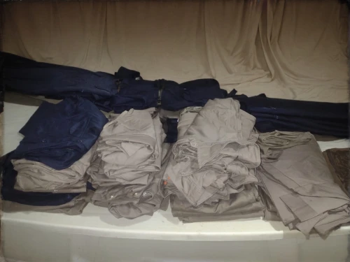 dry laundry,suit trousers,launder,laundry supply,clothes,turning cloths,laundry,linen,dry cleaning,mollete laundry,school clothes,clothing,clothes dryer,laundress,khaki pants,rolls of fabric,linens,men clothes,garments,t-shirts