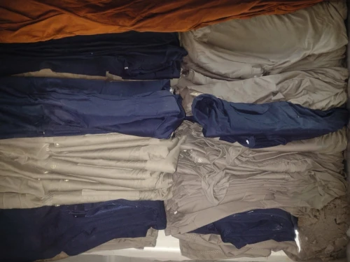 tent tops,khaki pants,trouser buttons,suit trousers,cargo pants,trousers,clothes,clothing,men clothes,climbing equipment,garments,carpenter jeans,linen,polo shirts,garment racks,tents,rolls of fabric,ammunition belt,equine coat colors,tent camp