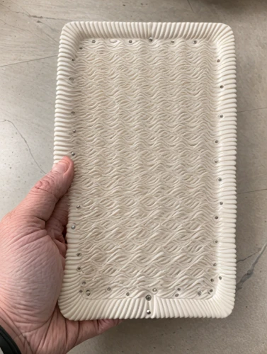 hands holding plate,ceramic tile,linen paper,serving tray,dishcloth,japanese wave paper,kraft notebook with elastic band,clay packaging,kitchen paper,corrugated cardboard,handmade paper,cuttingboard,plate full of sand,trivet,breadboard,mattress pad,napkin holder,recycled paper with cell,corrugated sheet,clay tile