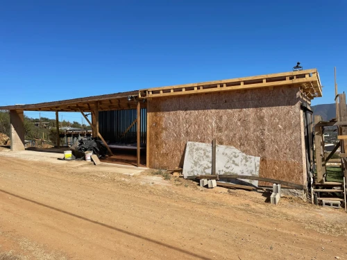 prefabricated buildings,eco-construction,unhoused,straw bale,piglet barn,chicken coop,a chicken coop,pioneertown,horse barn,timber house,dunes house,straw roofing,cowshed,cattle dairy,clay house,farm hut,ostrich farm,wooden frame construction,building insulation,building materials