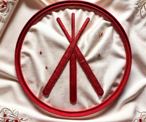 peace symbols,purity symbol,pentacle,red heart medallion,esoteric symbol,cardinal points,root chakra,peace sign,embroidered,vestment,embroidery,k badge,blood icon,dharma wheel,and symbol,red tablecloth,fire logo,red heart medallion on railway,triquetra,compass rose