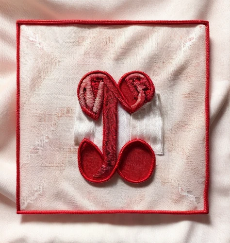 stitched heart,embroidered,linen heart,embroider,zippered heart,apple monogram,napkin,monogram,embroidery,red heart medallion,stitching,red ribbon,martisor,needlework,airbnb logo,handkerchief,blood icon,cotton pad,guest towel,cross-stitch