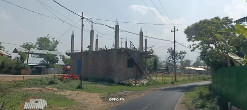 lahore,srinagar,kathmandu,build by mirza golam pir,street view,chitwan,khanpur,nepal,electrical lines,rural area,power pole,powerlines,rangpur,human settlement,pakistan,power lines,rural,row of houses,pubg mobile,google maps