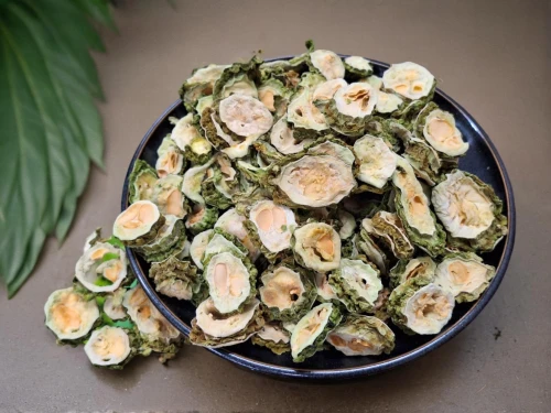 oysters rockefeller,stuffed clam,pecel,chile fir,grilled mussels,jalapeño popper,oysters,pine nut,okra peji,new england clam bake,hors' d'oeuvres,carciofi alla giudia,indonesian dish,pickled cucumbers,oyster vermicelli,bibingka,mixed pickles,pine nuts,otak-otak,wild garlic butter