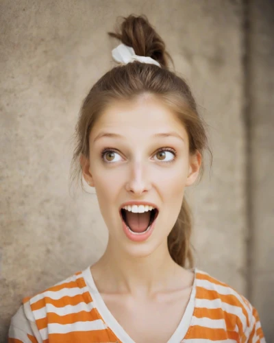 ecstatic,funny face,the girl's face,girl in t-shirt,updo,attractive woman,surprised,a girl's smile,cheerful,adorable,grin,beautiful face,goofy face,bun,laugh,woman face,cute,chignon,woman's face,ears