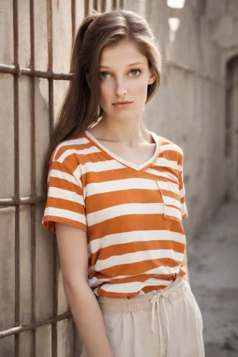 girl in t-shirt,striped background,cotton top,horizontal stripes,orange color,teen,orange,vintage girl,gap kids,portrait photography,liberty cotton,girl in a historic way,beautiful young woman,bright orange,eleven,young model istanbul,children's photo shoot,in a shirt,stripes,child model