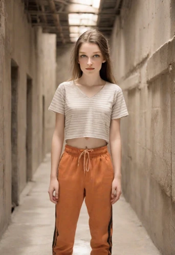 girl in overalls,concrete background,orange,khaki,concrete chick,menswear for women,trousers,prisoner,chainlink,orange half,prison,teen,rust-orange,basement,chasm,orange color,liberty cotton,cellar,cargo pants,khaki pants