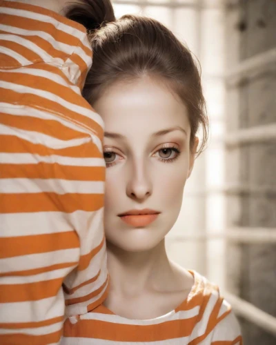 violence against women,woman thinking,conceptual photography,orange,depressed woman,woman face,the girl's face,applying make-up,young woman,self hypnosis,horizontal stripes,orange color,woman's face,portrait photography,retouching,female model,aperol,portrait photographers,women's eyes,photoshop manipulation