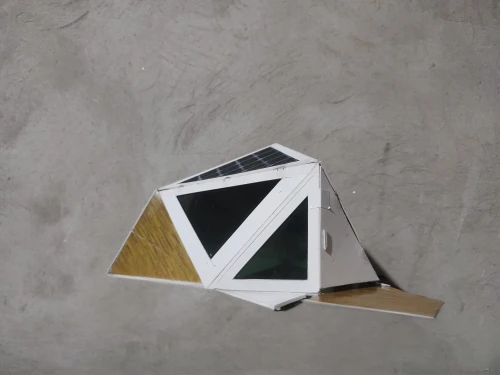 glass pyramid,rhombus,pyramid,paper stand,geometric solids,triangle ruler,paper umbrella,triangular,folded paper,green folded paper,triangles,folding table,paper frame,cube surface,napkin holder,origami paper plane,geometric,polygonal,geometry shapes,mobile sundial