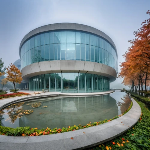 home of apple,dupage opera theatre,futuristic art museum,mercedes-benz museum,chancellery,guggenheim museum,oval forum,glass facade,mercedes museum,hall of nations,futuristic architecture,glass building,performing arts center,modern architecture,corporate headquarters,mclaren automotive,fall landscape,new city hall,new building,glass facades,Photography,General,Realistic