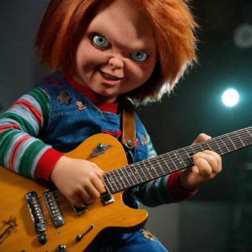 voo doo doll,killer doll,clay doll,voodoo doll,string puppet,minions guitar,a voodoo doll,redhead doll,johnny jump up,wooden doll,the voodoo doll,child's play,collectible doll,guitar player,kewpie doll,artist doll,guitar head,doll's facial features,pumuckl,female doll