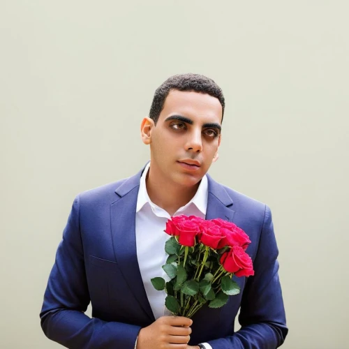 with roses,holding flowers,with a bouquet of flowers,rose png,abdel rahman,florist gayfeather,formal guy,on a red background,florist,social,rose bouquet,bouquets,floral background,flower background,yellow rose background,roses,rose arrangement,red rose,portrait background,red roses