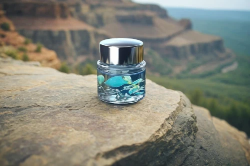 mountain spirit,juniper berry,perfume bottle,natural perfume,genuine turquoise,lensball,hand sanitizer,chalk stack,river juniper,the spirit of the mountains,glass container,poison bottle,nail oil,natural water,mountain spring,diamond lagoon,mountain top,south rim,angel's landing,blue mountain,Small Objects,Outdoor,Cliffside