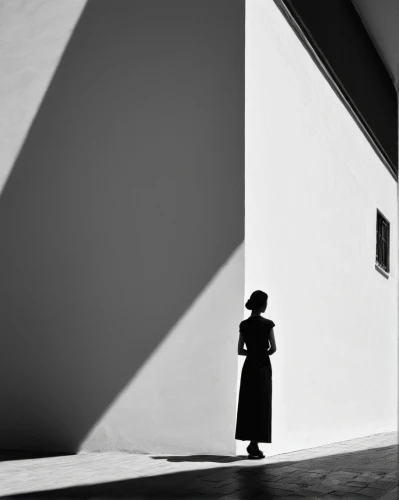 woman silhouette,woman walking,girl walking away,long shadow,light and shadow,women silhouettes,in a shadow,blackandwhitephotography,shadow play,stieglitz,praying woman,andreas cross,woman thinking,olle gill,monochrome photography,sillouette,shadows,street photography,shadow,girl in a long dress,Photography,Black and white photography,Black and White Photography 01
