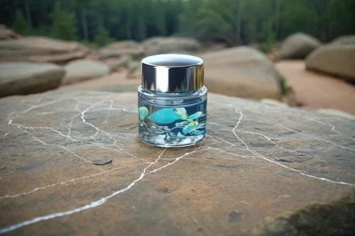genuine turquoise,glass container,juniper berry,natural perfume,poison bottle,glass jar,mountain spirit,healing stone,perfume bottle,prostrate juniper,message in a bottle,constellation pyxis,chalk stack,glass rock,sea water salt,emerald sea,river juniper,nail oil,turquoise,bottle surface