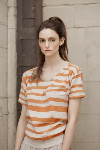 striped background,horizontal stripes,menswear for women,orange,striped,stripes,cotton top,female model,girl in t-shirt,a wax dummy,french silk,pin stripe,mime,portrait background,depressed woman,polo shirt,portrait of a girl,antique background,burglary,clothes pin