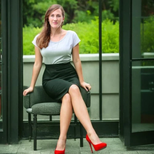 pencil skirt,business girl,business woman,secretary,businesswoman,beautiful legs,sitting on a chair,red skirt,female model,bussiness woman,legs crossed,women in technology,ceo,red shoes,red bench,rhonda rauzi,real estate agent,black shoes,composites,court shoe