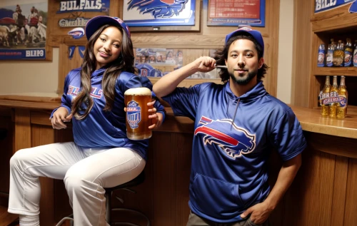 blue jays,cubs,sports fan accessory,beer bottles,pabst blue ribbon,sports drink,beer pitcher,beer banks,drinking establishment,advertising campaigns,rangers,female alcoholism,sports jersey,drinking party,barware,miller,beer tap,wife and husband,liquor bar,pub