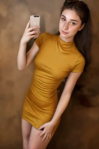 yellow background,woman holding a smartphone,female model,phuquy,see-through clothing,yellow,photo model,yellow orange,ammo,yellow and black,yellow jumpsuit,hd,using phone,art model,ad,yellow brown,yellow color,na,wifi png,tiktok