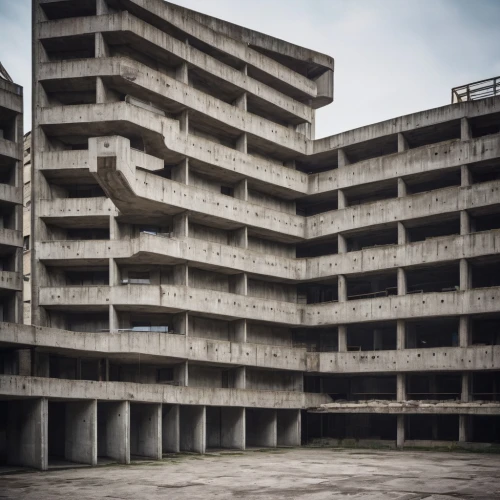 multi storey car park,brutalist architecture,car park,hashima,underground car park,apartment block,concrete,underground garage,disused,block of flats,prora,apartments,tower block,an apartment,apartment blocks,housing estate,luxury decay,parking place,apartment building,panopticon,Photography,General,Cinematic