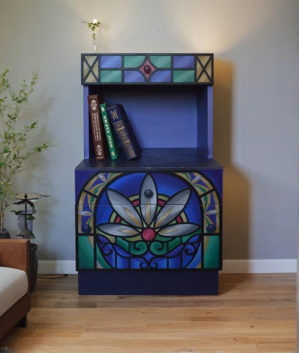 chest of drawers,end table,tv cabinet,contemporary decor,storage cabinet,mosaic tealight,mosaic glass,stained glass pattern,modern decor,bookcase,sideboard,mosaic tea light,fire screen,metal cabinet,switch cabinet,armoire,art deco frame,bookshelves,patterned wood decoration,crayon frame