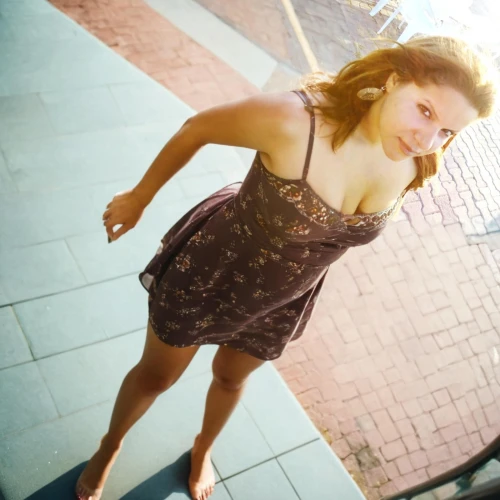 portrait photography,girl on the stairs,female model,female runner,girl walking away,a girl in a dress,torn dress,woman walking,portrait photographers,city ​​portrait,street dancer,short dress,magnolieacease,young woman,barefoot,sidewalk,girl in a long dress,fusion photography,woman playing tennis,on the roof