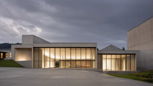 archidaily,glass facade,chancellery,exposed concrete,modern architecture,swiss house,christ chapel,modern house,glass facades,contemporary,facade panels,music conservatory,frame house,concert hall,architectural,modern building,structural glass,architecture,kirrarchitecture,house hevelius,Photography,General,Realistic