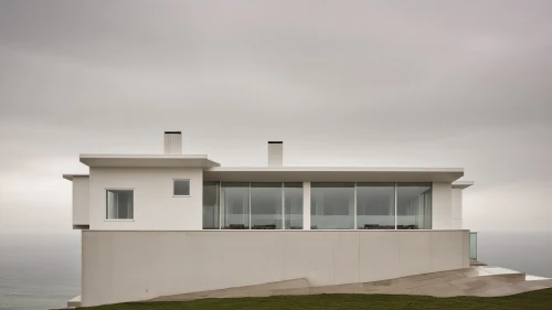 dunes house,beach house,cubic house,modern architecture,lifeguard tower,window with sea view,beachhouse,cube house,house of the sea,danish house,modern house,frame house,holiday home,summer house,model house,inverted cottage,house with caryatids,house shape,housetop,residential house,Photography,General,Realistic