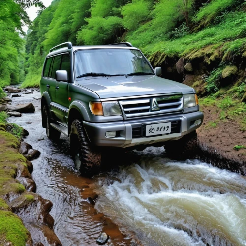 toyota land cruiser,isuzu trooper,mitsubishi pajero,suzuki jimny,mitsubishi endeavor,four wheel drive,off-roading,toyota land cruiser prado,suzuki sj,tata sumo,tata safari,offroad,4 wheel drive,six-wheel drive,isuzu forward,ford ranger,all-terrain,mitsubishi l300,off-road,pajero,Photography,General,Realistic