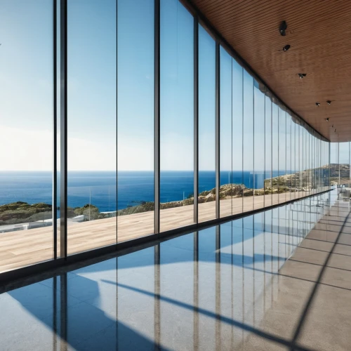 structural glass,glass facade,glass wall,window film,daylighting,window with sea view,glass panes,glass facades,kourion,dunes house,glass pane,the observation deck,powerglass,glass roof,archidaily,thin-walled glass,observation deck,glass tiles,double-walled glass,glass window