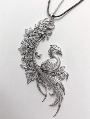 necklace with winged heart,silver octopus,filigree,jewelry florets,feather jewelry,ornamental bird,an ornamental bird,pendant,floral ornament,dragon design,metal embossing,locket,body jewelry,gift of jewelry,enamelled,diamond pendant,bookmark with flowers,mourning swan,ornate pocket watch,silversmith