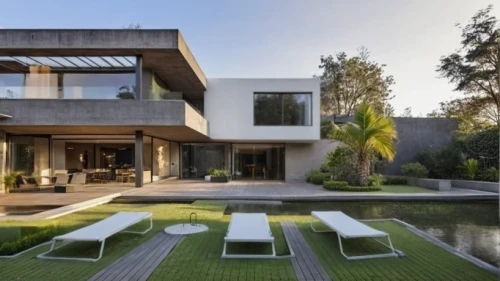 modern house,modern architecture,cube house,dunes house,house shape,luxury property,cubic house,beautiful home,residential house,luxury home,cube stilt houses,florida home,house by the water,exposed concrete,large home,modern style,mansion,luxury real estate,two story house,holiday villa