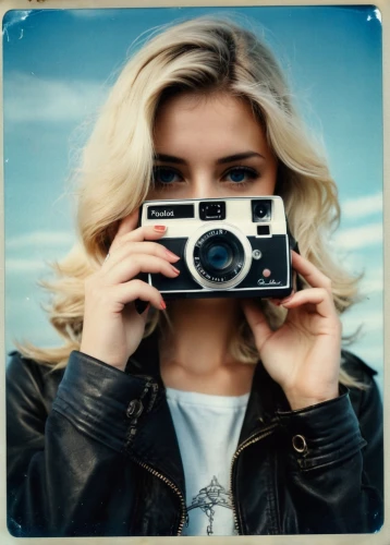 the blonde photographer,a girl with a camera,lubitel 2,vintage camera,mirrorless interchangeable-lens camera,photo-camera,photo camera,instant camera,zenit camera,photographs,vintage girl,slr camera,minolta,magnolieacease,camera,retro frame,leica,zenit et,taking photo,portrait photographers,Photography,Documentary Photography,Documentary Photography 03