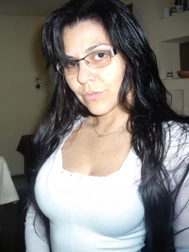 web cam,webcam,white shirt,with glasses,reading glasses,black hair,white lady,eye glasses,glasses,silver framed glasses,specs,lace wig,geek,image editing,white clothing,white and black color,white and black,old photos,undershirt,eyeglasses