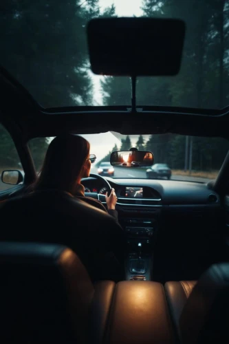 woman in the car,girl in car,passenger,witch driving a car,coach-driving,behind the wheel,automotive mirror,girl and car,drive,backseat,volvo xc90,headlights,autonomous driving,volvo cars,windshield,volvo 850,open road,alpine drive,road trip,passengers