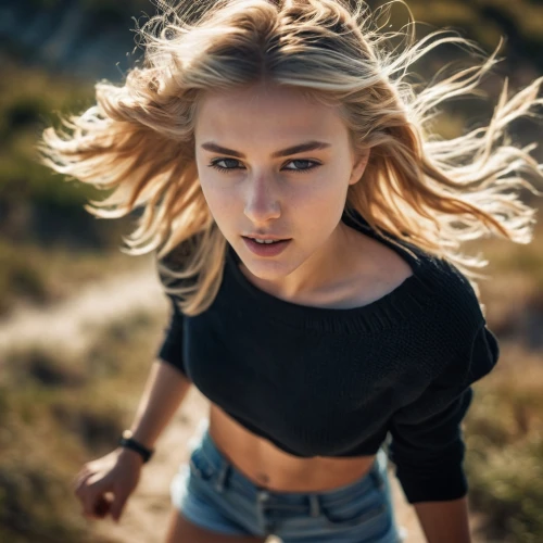 girl in t-shirt,blond girl,blonde girl,girl on the dune,portrait photography,teen,blonde woman,female model,girl walking away,cool blonde,girl portrait,little girl in wind,young woman,fierce,model beauty,elsa,beautiful young woman,crop top,young model,pretty young woman,Photography,General,Cinematic