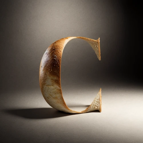 shofar,curlicue,sickle,volute,curve,ringed-worm,conceptual photography,wooden rings,horseshoes,curved ribbon,semicircular,horn of amaltheia,golden ring,calla,crescent moon,time spiral,harp,s curve,horn,crescent,Realistic,Foods,Bread