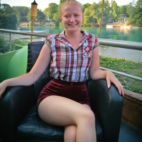 girl on the river,girl on the boat,danube cruise,sitting on a chair,blonde on the chair,on the river,floating on the river,the blonde in the river,floating restaurant,swedish german,greta oto,riverboat,floating market,boat operator,in shorts,alster city,boat ride,alster,wisla,legs crossed