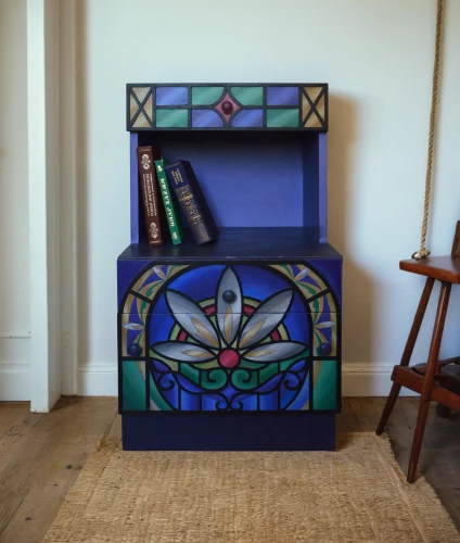 chest of drawers,armoire,tv cabinet,storage cabinet,switch cabinet,end table,fire screen,baby changing chest of drawers,video game arcade cabinet,sideboard,metal cabinet,lectern,lyre box,art deco frame,crayon frame,filing cabinet,bookcase,tetris,chiffonier,decorative frame