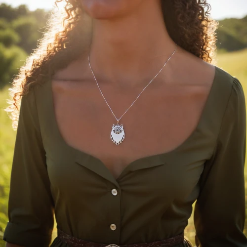 necklace with winged heart,diamond pendant,necklace,pendant,necklaces,pearl necklaces,locket,solar quartz,jewelry（architecture）,hamsa,gift of jewelry,heart chakra,linen heart,coral charm,jewelry florets,pearl necklace,ladies pocket watch,jewelry,bridal jewelry,house jewelry