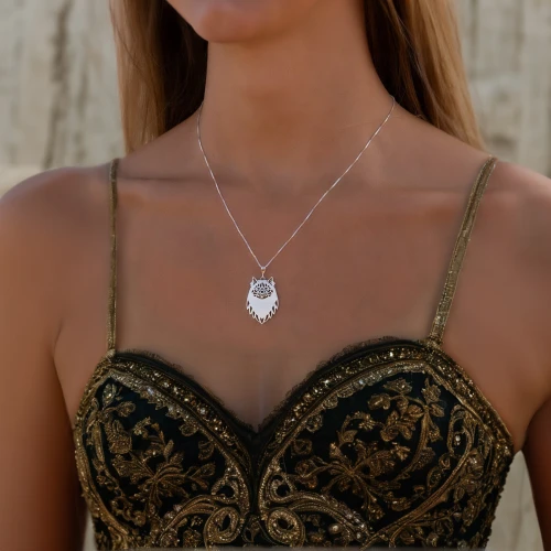 diamond pendant,necklace with winged heart,pearl necklaces,necklace,pendant,pearl necklace,necklaces,jewelry florets,coral charm,jewelry（architecture）,red heart medallion,bridal jewelry,gift of jewelry,hamsa,christmas jewelry,house jewelry,diamond jewelry,jewelry,love pearls,semi precious stone