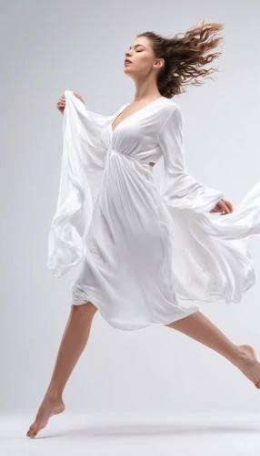 gracefulness,whirling,taijiquan,dance with canvases,leap for joy,modern dance,love dance,sprint woman,qi gong,cartwheel,equal-arm balance,girl on a white background,dance,divine healing energy,ballet dancer,twirl,dancer,pirouette,levitation,graceful,Photography,General,Commercial