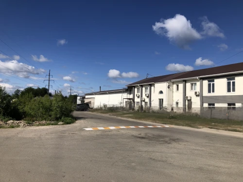 prora,block of houses,row of houses,town buildings,new housing development,human settlement,old factory building,street view,blocks of houses,prefabricated buildings,steinbach,bogart village,townhouses,former prison,industrial building,barracks,white buildings,contract site,residential area,apartment buildings