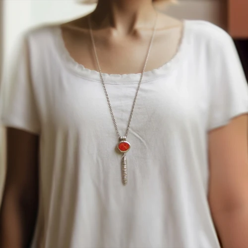 coral charm,red heart medallion,necklace with winged heart,necklace,martisor,red heart medallion in hand,pendant,red white tassel,necklaces,locket,red heart medallion on railway,pearl necklaces,hamsa,buddhist prayer beads,amulet,pearl necklace,linen heart,deep coral,jizo,diamond pendant